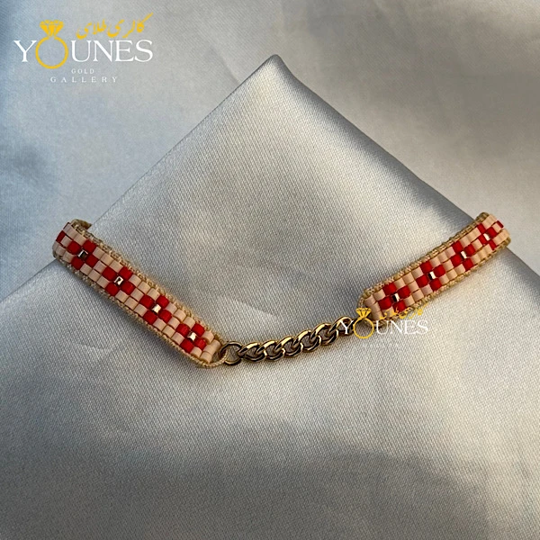 تصویر دوم دستبند میوکی قرمز صورتی کارتیر طلا